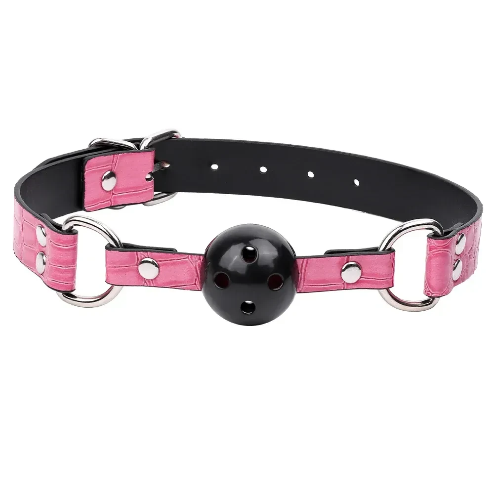 gag avec balle rouge et noire